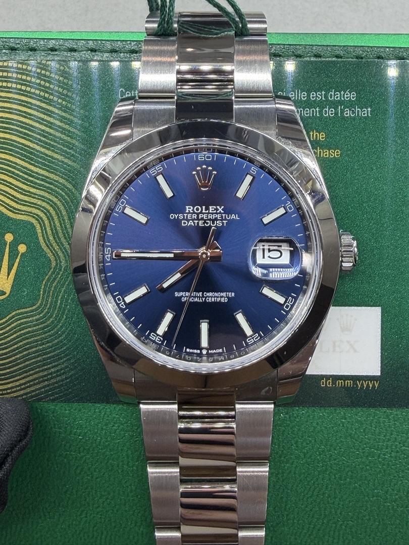 Rolex-_-Datejust-Blue-Dial-_-126300-_-41mm-_-2024-_-Automatic-_-Oyster-Bracelet-_-Papers-_-12900-106689192_1-1.jpg Rolex Datejust - Image 1