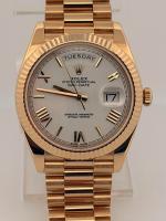 Rolex Day-Date 40 228238 White Roman Dial 40mm Automatic Yellow Gold President Bracelet Fluted Bezel Naked